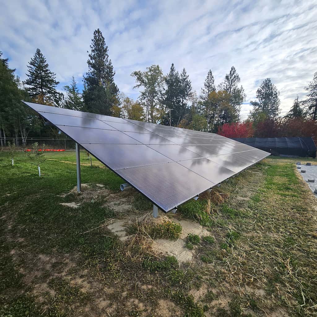 ground mount solar with grass and trees